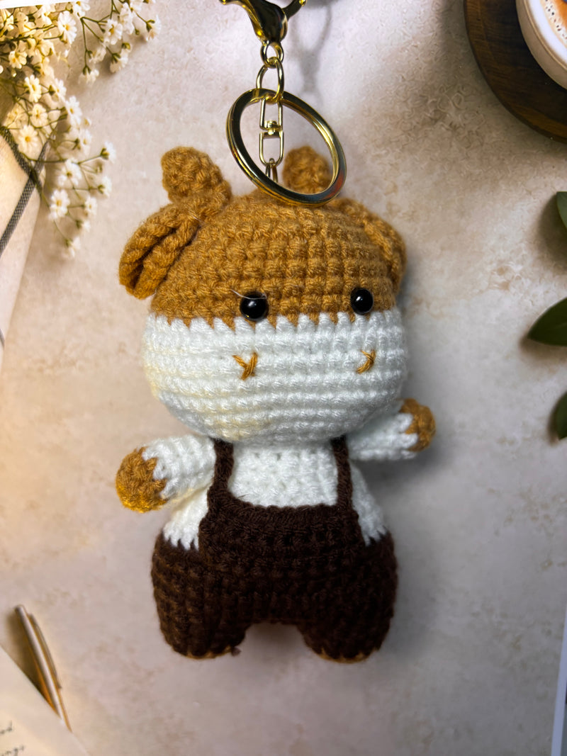 Handmade crochet bear doll keychain with mustard overalls